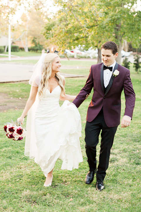 Autumn-inspired-wedding-at-coto-valley-country-club-bride-and-groom-holding-hands-walking