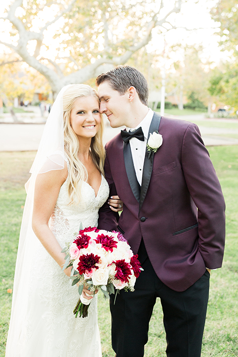 Autumn-inspired-wedding-at-coto-valley-country-club-bride-and-groom-hugging-smiling