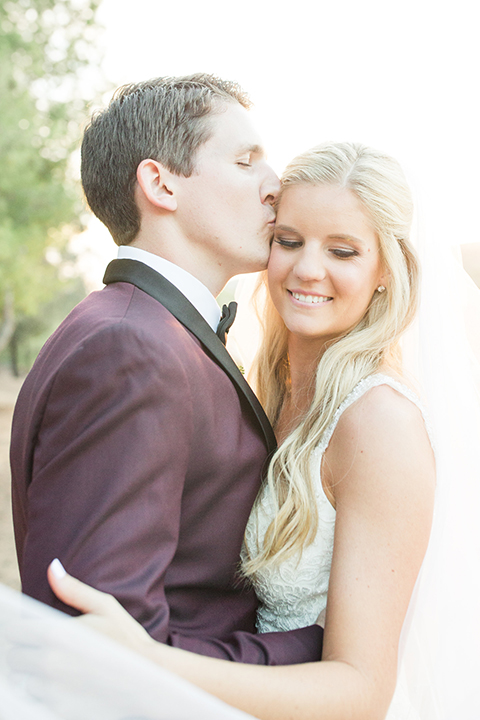 Autumn-inspired-wedding-at-coto-valley-country-club-bride-and-groom-standing-hugging-close-up