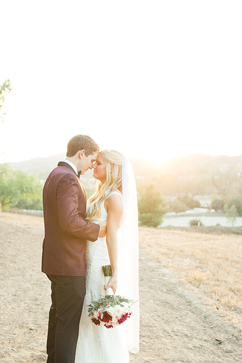 Autumn-inspired-wedding-at-coto-valley-country-club-bride-and-groom-standing-hugging