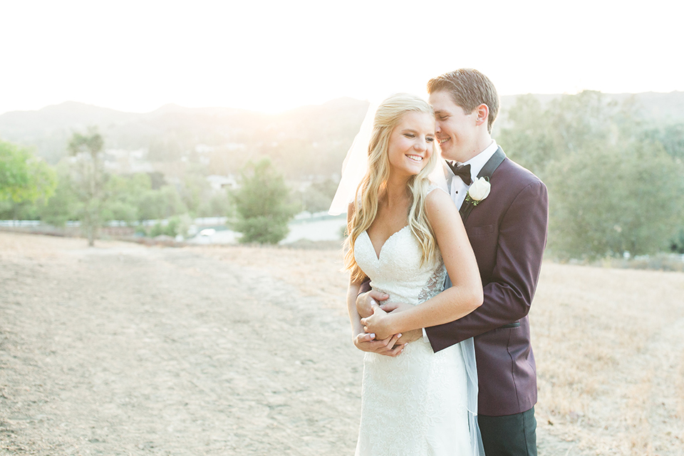 Autumn-inspired-wedding-at-coto-valley-country-club-bride-and-groom-standing-smiling