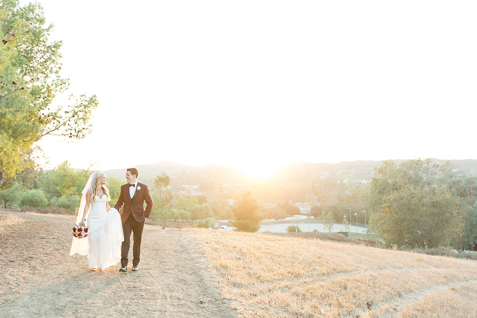 Autumn-inspired-wedding-at-coto-valley-country-club-bride-and-groom-standing-walking