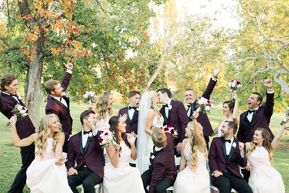 Autumn-inspired-wedding-at-coto-valley-country-club-bride-and-groom-with-wedding-party-cheering