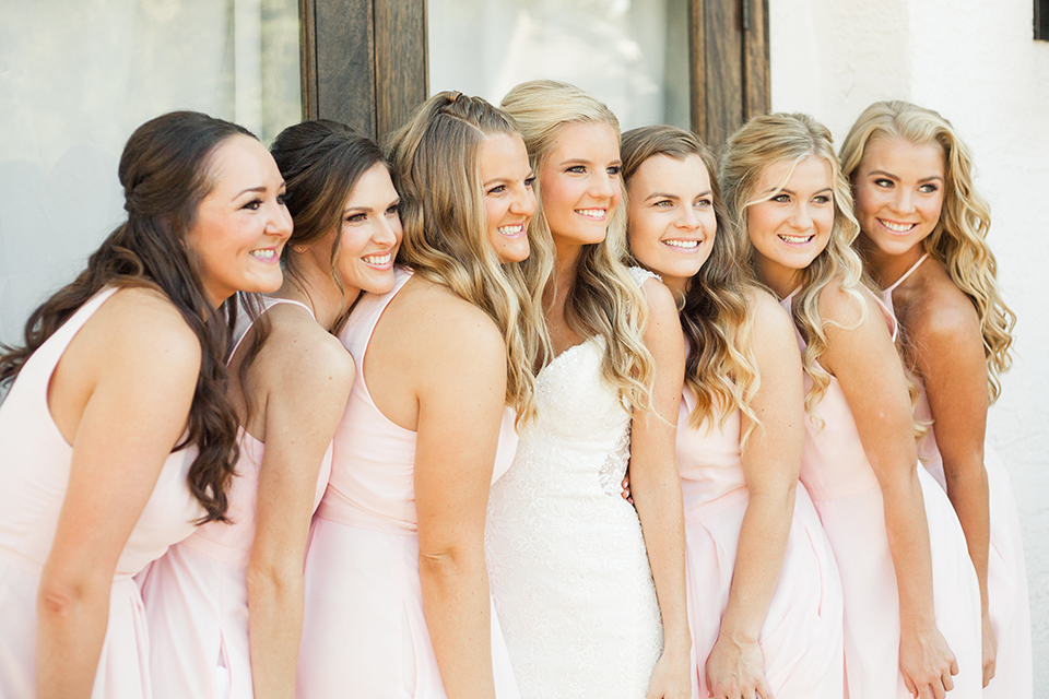 Autumn-inspired-wedding-at-coto-valley-country-club-bride-with-bridesmaids-smiling