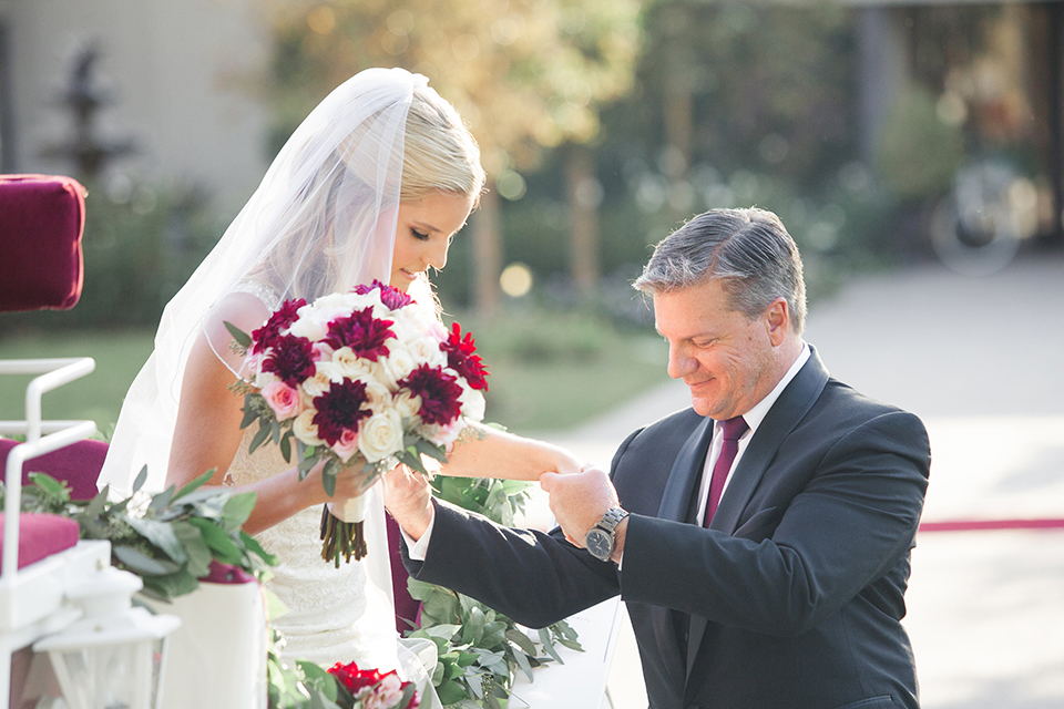 Autumn-inspired-wedding-at-coto-valley-country-club-ceremony-bride-getting-off-carriage