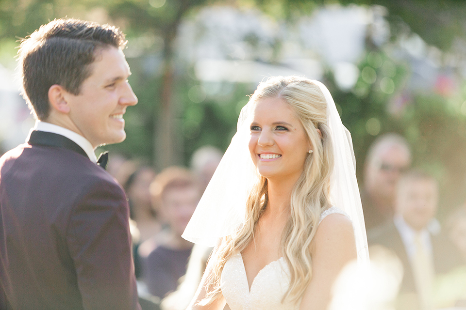 Autumn-inspired-wedding-at-coto-valley-country-club-ceremony-bride-smiling