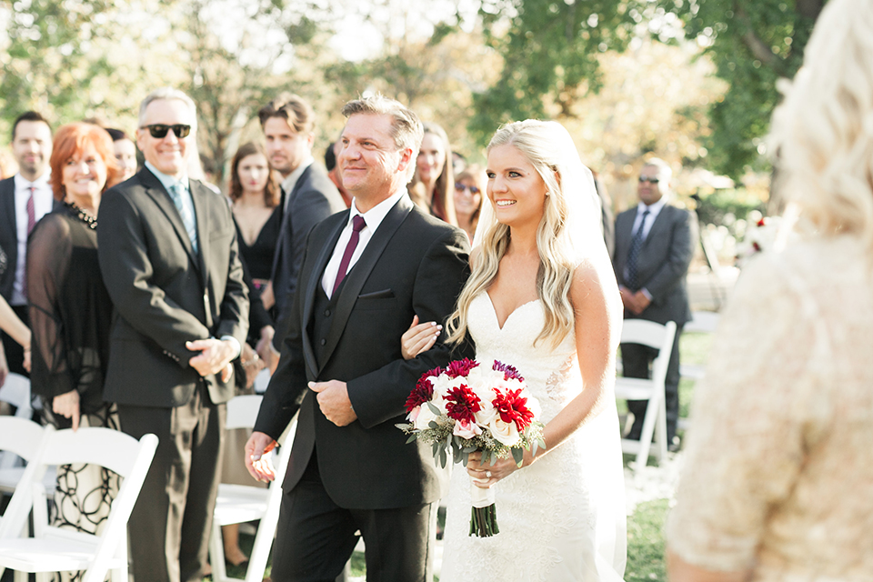 Autumn-inspired-wedding-at-coto-valley-country-club-ceremony-bride-walking-down-the-aisle