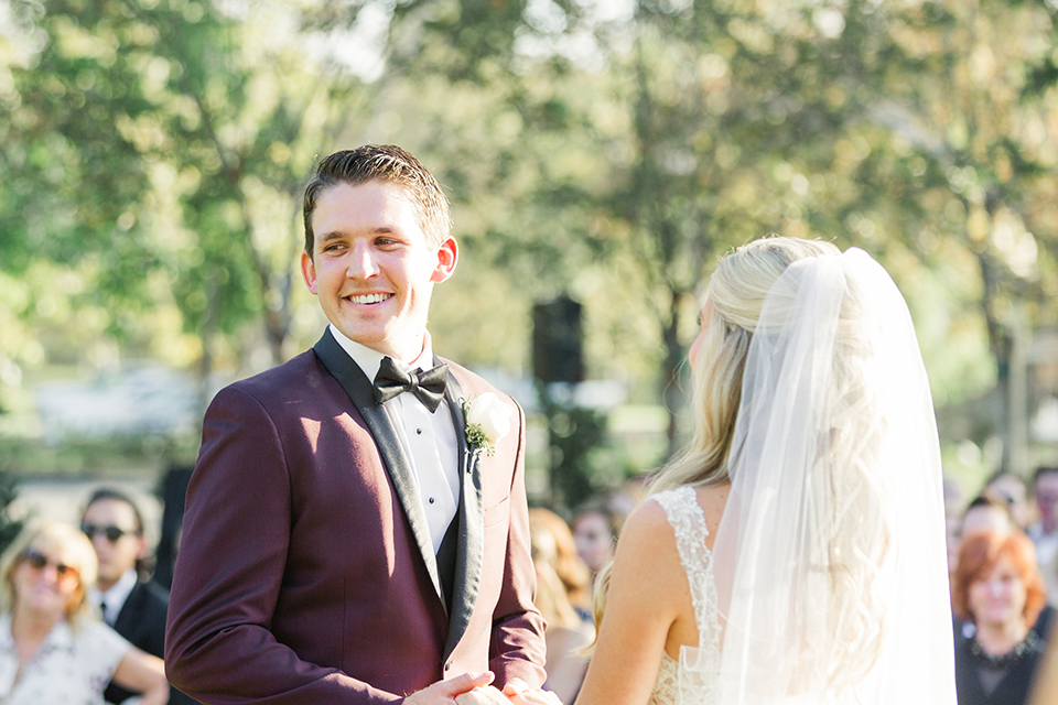 Autumn-inspired-wedding-at-coto-valley-country-club-ceremony-groom-smiling