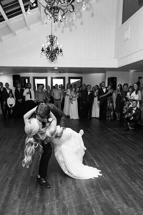 Autumn-inspired-wedding-at-coto-valley-country-club-reception-bride-and-groom-first-dance-kissing