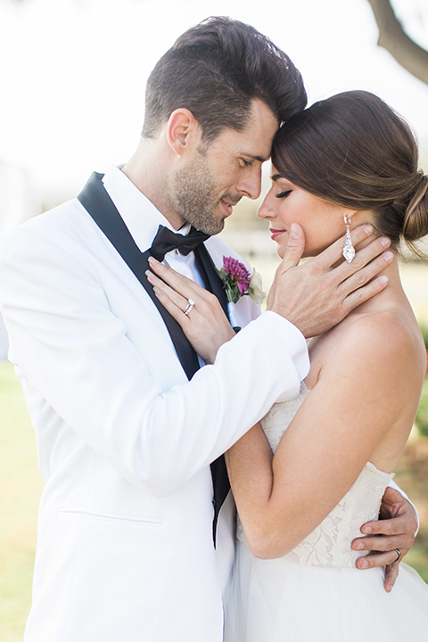 Santa-barbara-outdoor-wedding-bride-and-groom-holding-each-other