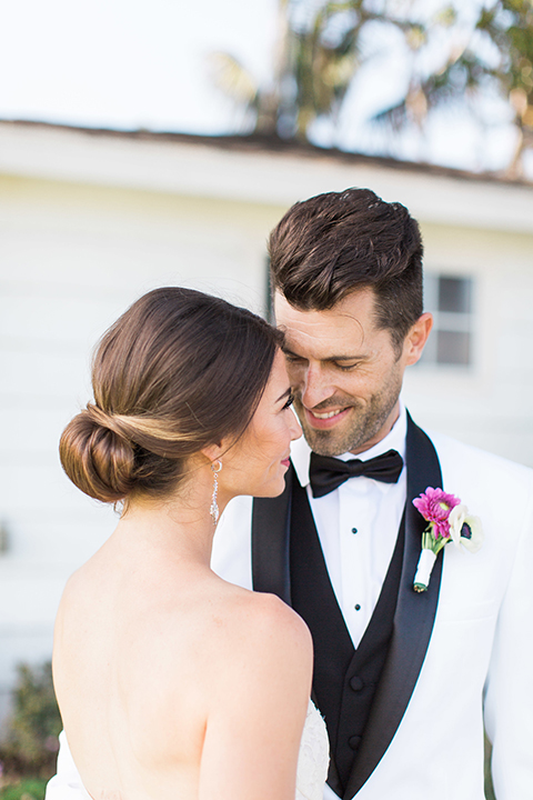 Santa-barbara-outdoor-wedding-bride-and-groom-hugging-close-up