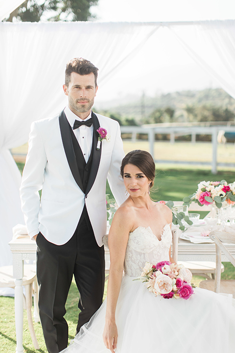 Santa-barbara-outdoor-wedding-bride-and-groom-sitting-at-table