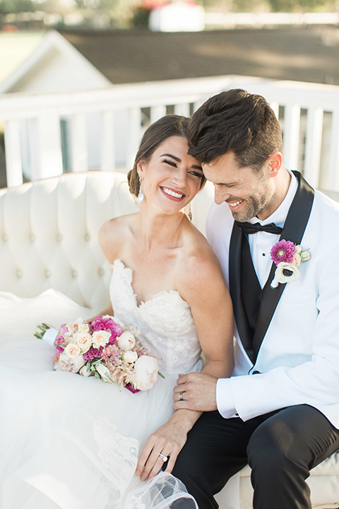 Santa-barbara-outdoor-wedding-bride-and-groom-sitting-close-up