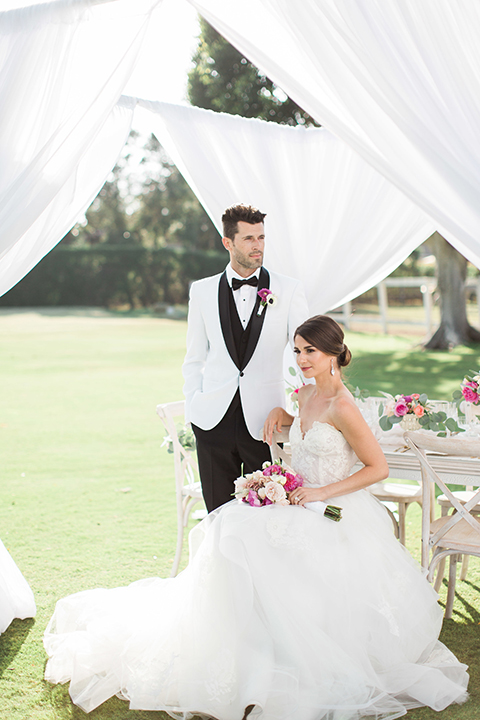 Santa-barbara-outdoor-wedding-bride-and-groom-sitting