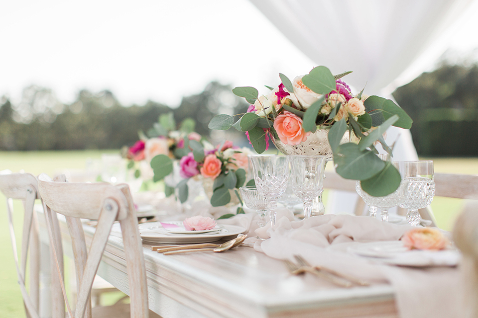 Santa-barbara-outdoor-wedding-table-set-up-with-flowers