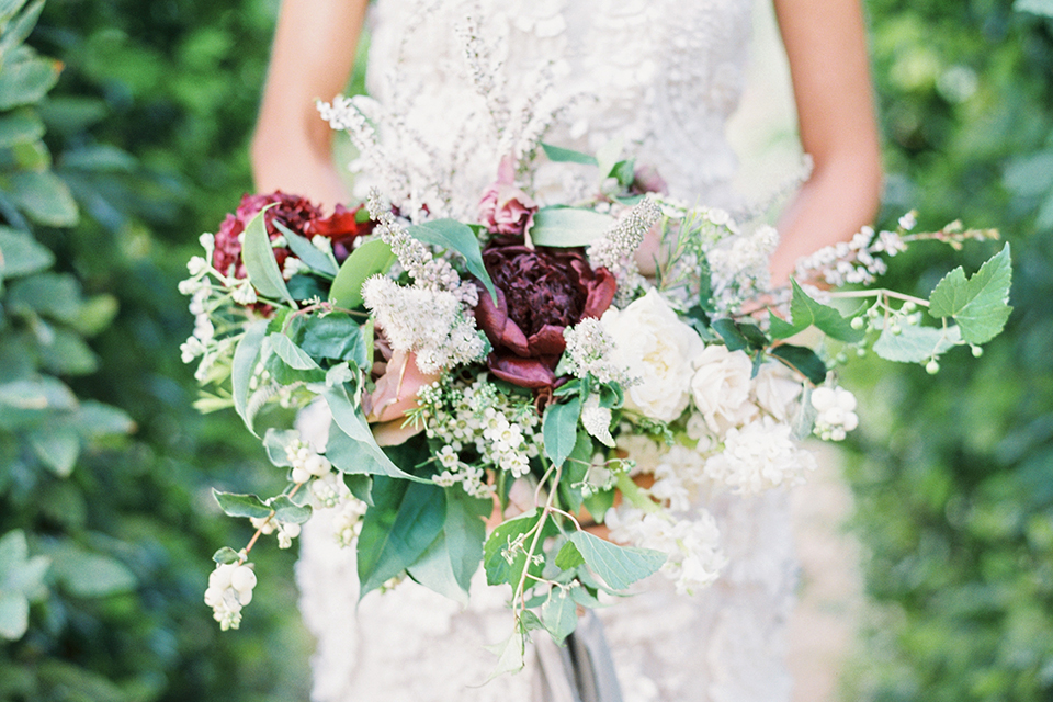 Santa-barbara-outdoor-wedding-at-kestrel-park-bride-holding-bouquet-close-up
