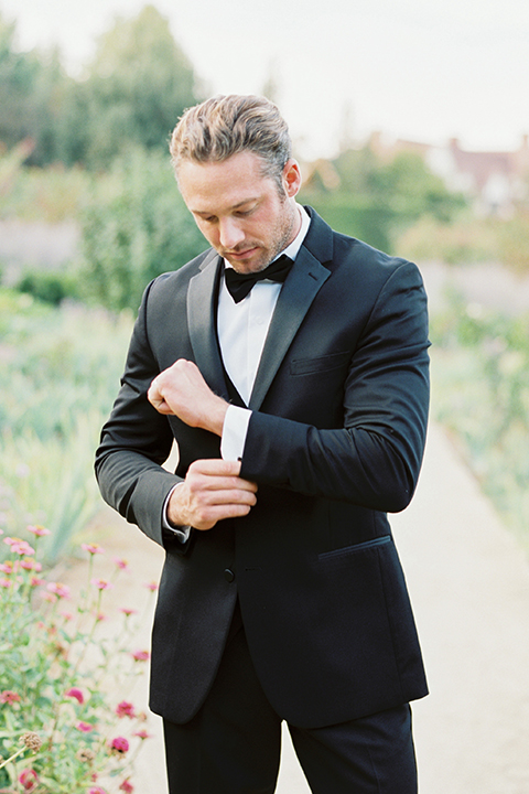 Santa-barbara-outdoor-wedding-at-kestrel-park-groom-black-tuxedo-close-up