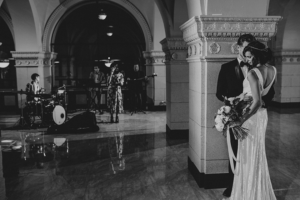 Los-angeles-wedding-at-the-majestic-bride-and-groom-hugging-black-and-white