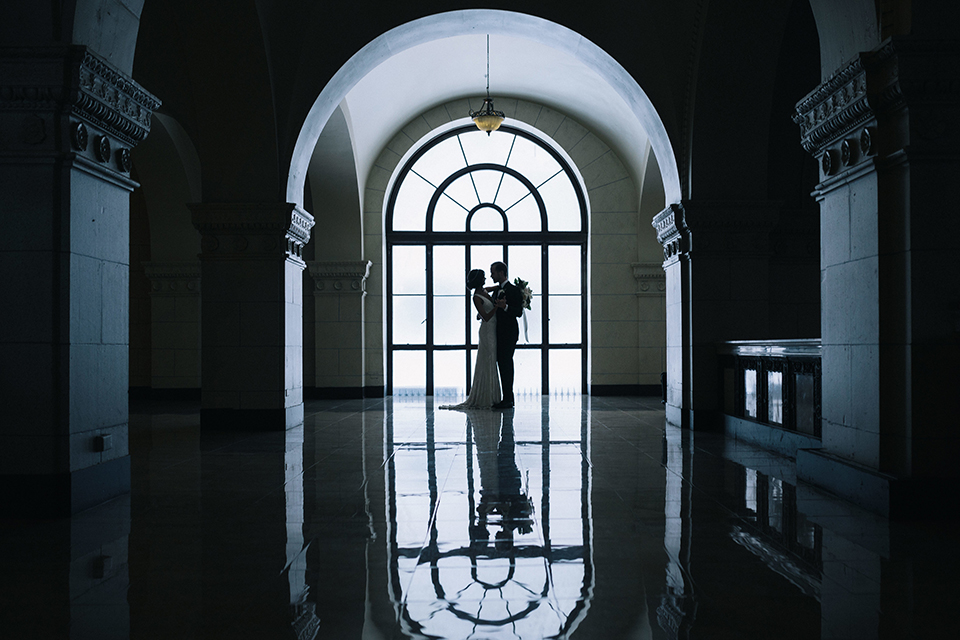 Los-angeles-wedding-at-the-majestic-bride-and-groom-hugging-holding-hands