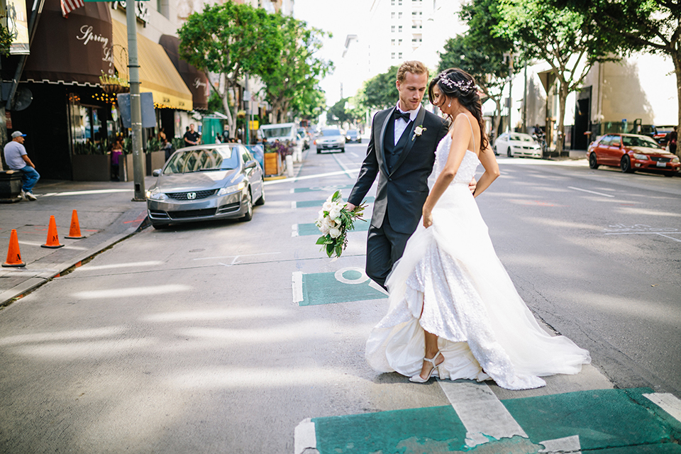 Los-angeles-wedding-at-the-majestic-bride-and-groom-walking-smiling