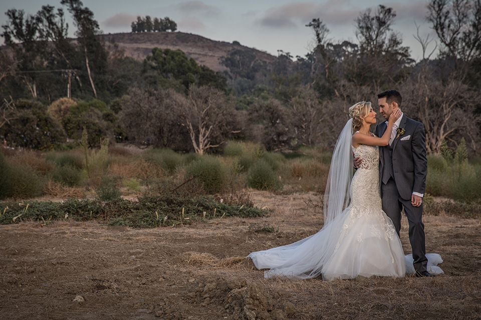 Orange-county-wedding-at-the-hamilton-oaks-winery-bride-and-groom-hugging-standing