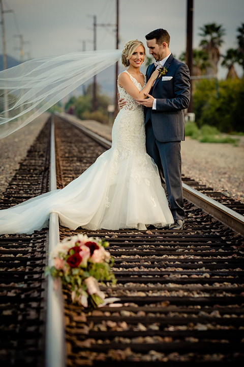 Orange-county-wedding-at-the-hamilton-oaks-winery-bride-and-groom-standing-hugging