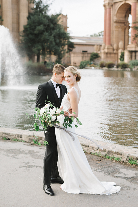 San-francisco-palace-wedding-shoot-bride-and-groom-standing-hugging