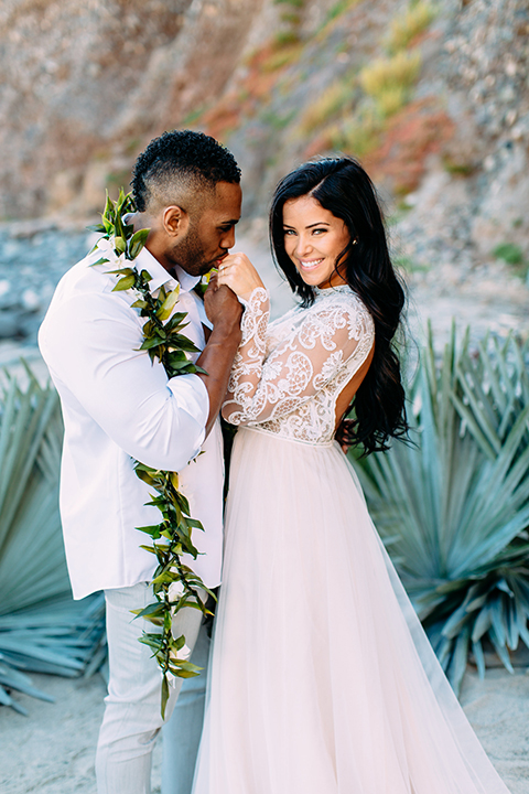 Orange-county-beach-wedding-in-dana-point-bride-and-groom-hugging-and-kissing