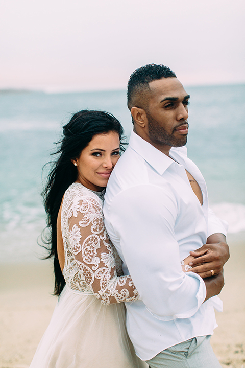 Orange-county-beach-wedding-in-dana-point-bride-and-groom-standing-and-hugging-close-up