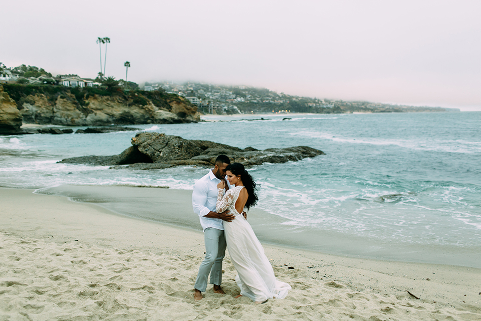 Orange-county-beach-wedding-in-dana-point-bride-and-groom-standing-on-beach