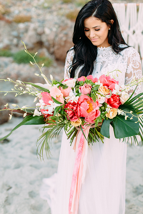 Orange-county-beach-wedding-in-dana-point-bride-holding-bouquet