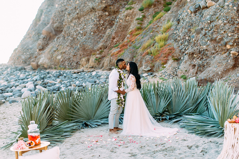 Orange-county-beach-wedding-in-dana-point-ceremony-bride-and-groom-kissing