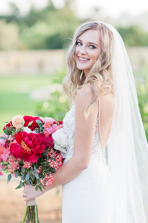 Palm-springs-wedding-shoot-at-old-polo-estate-bride-holding-bouquet