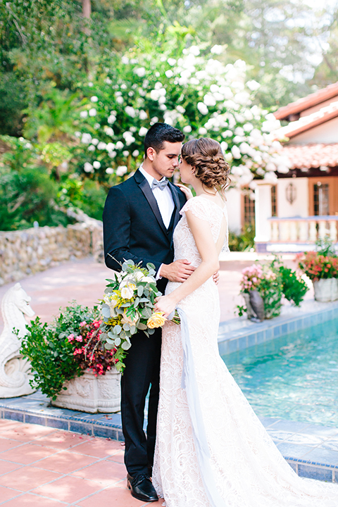 Rancho-las-lomas-outdoor-wedding-bride-and-groom-hugging