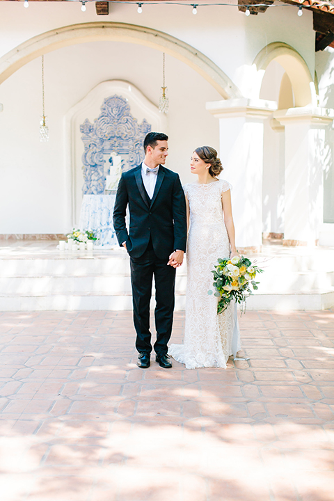 Rancho-las-lomas-outdoor-wedding-bride-and-groom-standing-walking