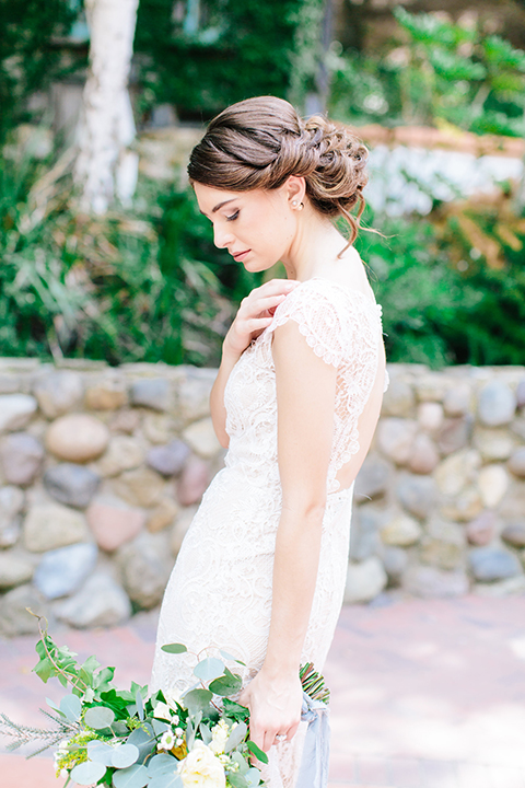 Rancho-las-lomas-outdoor-wedding-bride-holding-bouquet-close-up