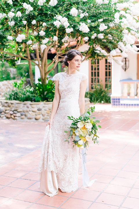 Rancho-las-lomas-outdoor-wedding-bride-holding-bouquet