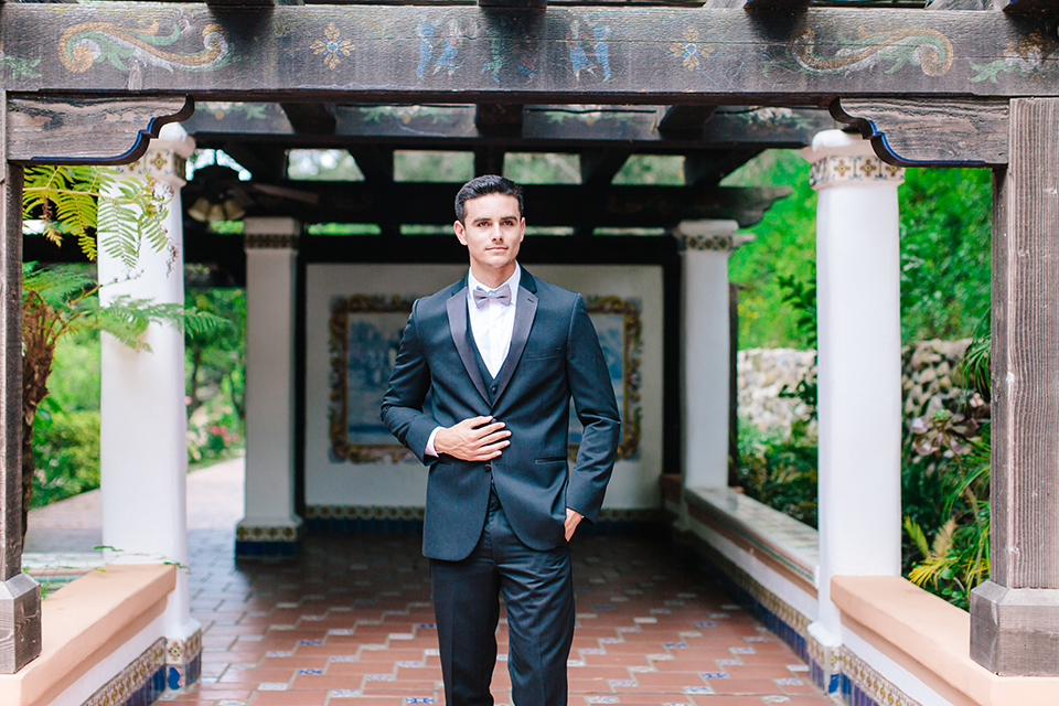 Rancho-las-lomas-outdoor-wedding-groom-black-tuxedo-close-up