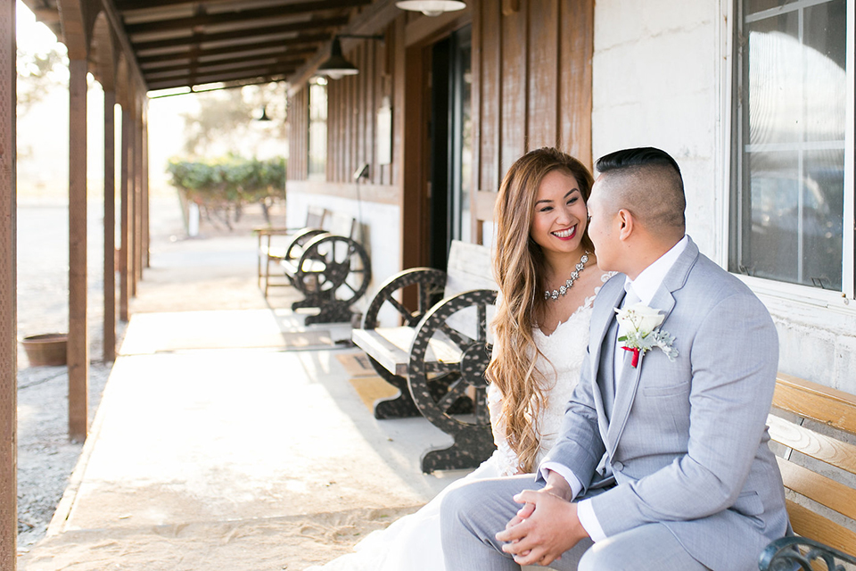 Northern-california-wedding-shoot-at-fitz-place-bride-and-groom-sitting-smiling