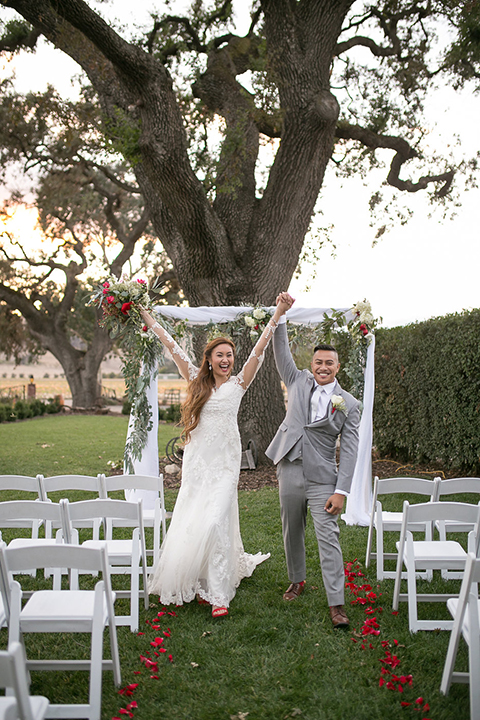 Northern-california-wedding-shoot-at-fitz-place-ceremony-bride-and-groom-cheering