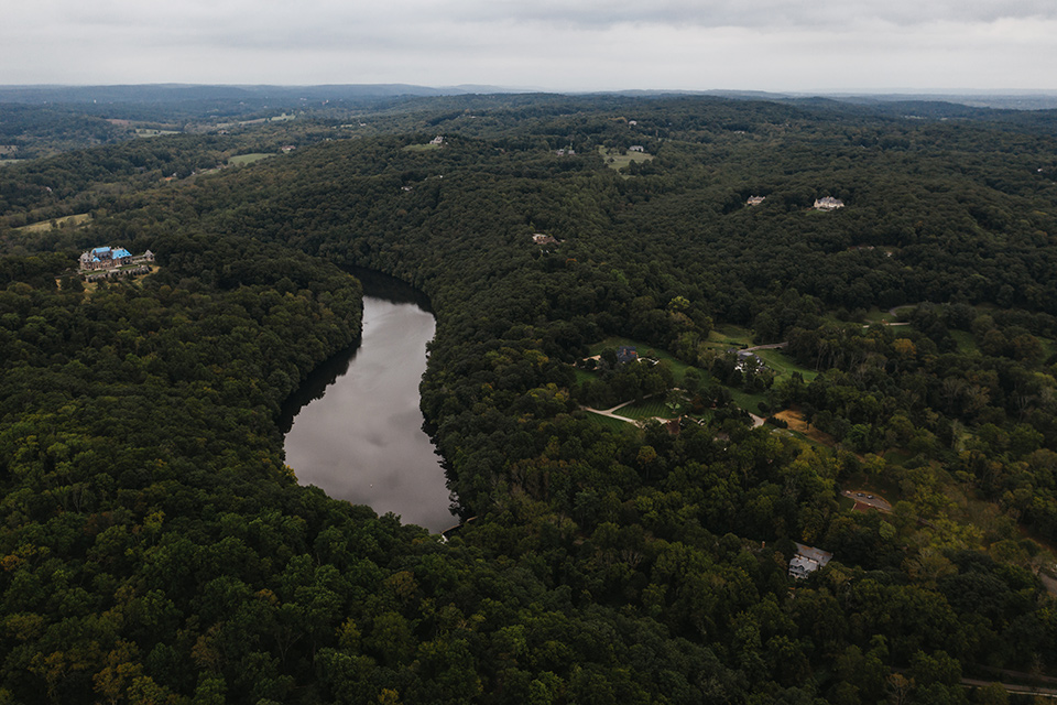 The-Mansion-at-Natirar-drone-of-lush-forrest-and-mansion