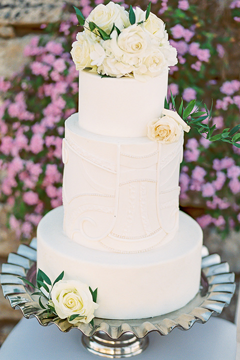 callaway-winery-shoot-close-up-on-cake-three-tier-cake-all-white-with-ivory-florals