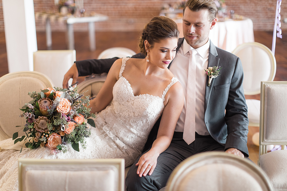 Orange-county-whimsical-wedding-at-franciscan-gardens-bride-and-groom-hugging