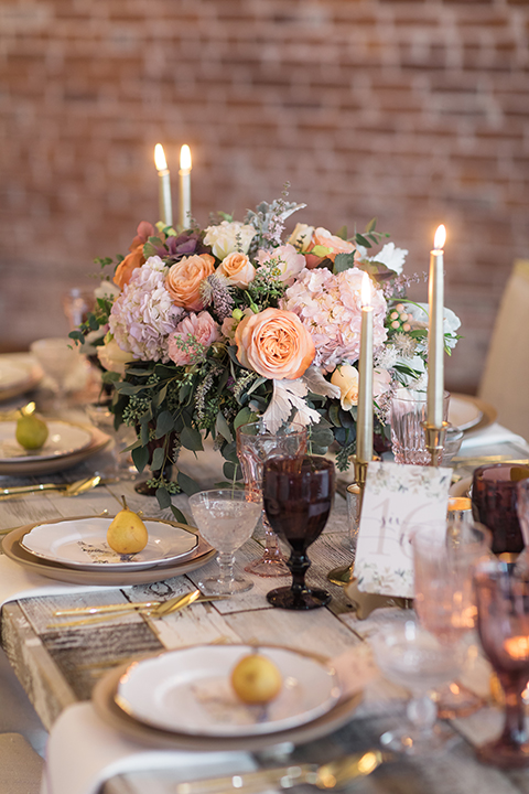 Orange-county-whimsical-wedding-at-franciscan-gardens-table-set-up-with-flowers