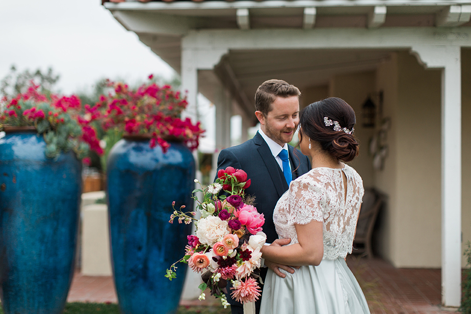 San-diego-outdoor-wedding-at-the-inn-at-rancho-santa-fe-bride-and-groom-hugging-close-up