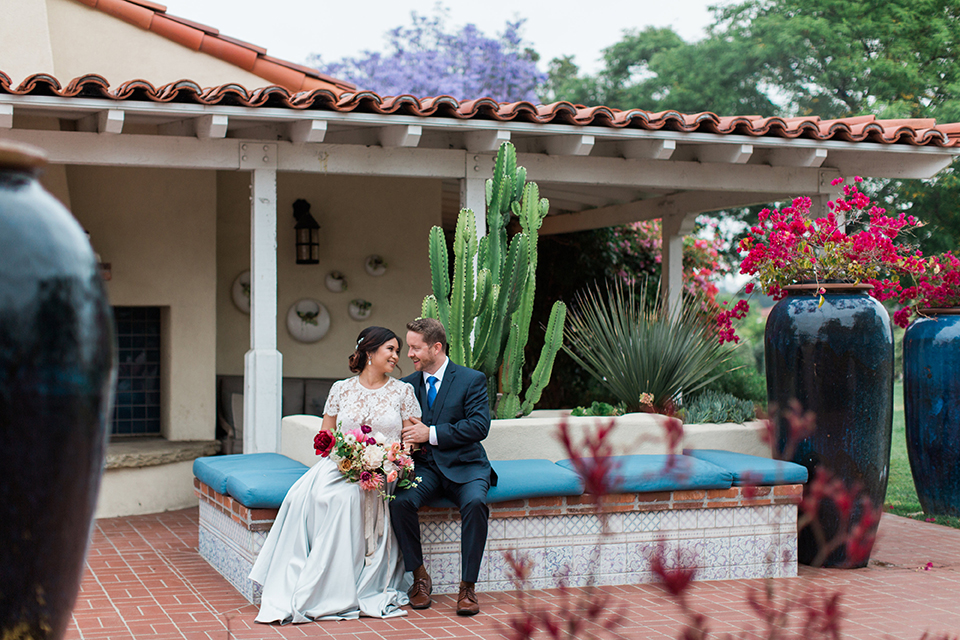 San-diego-outdoor-wedding-at-the-inn-at-rancho-santa-fe-bride-and-groom-sitting