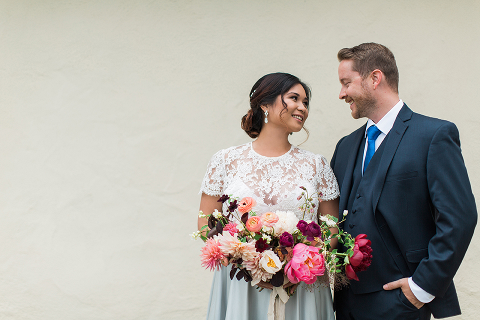 San-diego-outdoor-wedding-at-the-inn-at-rancho-santa-fe-bride-and-groom-standing-smiling