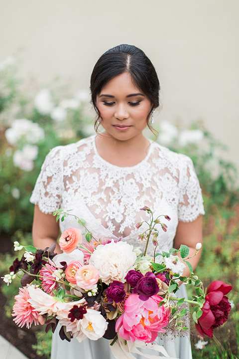 San-diego-outdoor-wedding-at-the-inn-at-rancho-santa-fe-bride-holding-bouquet-close-up