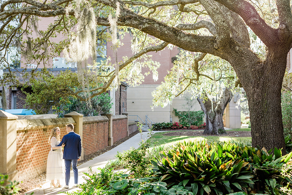 South-carolina-summer-outdoor-wedding-at-the-wickliffe-house-bride-and-groom-standing-walking-far-away