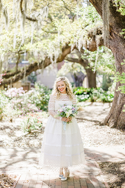 South-carolina-summer-outdoor-wedding-at-the-wickliffe-house-bride-holding-bouquet